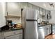 Kitchen view showcasing stainless steel appliances and granite countertops at 529 N Washington St # 304, Denver, CO 80203