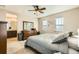 Bright and airy bedroom with ensuite bathroom access at 9638 Albion Ln, Thornton, CO 80229