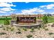 Timberleaf community sign with stone base, landscaping, and blue sky background at 13455 Valentia Pl, Thornton, CO 80602