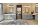 Double vanity bathroom with a view into bedroom at 1043 Meteor Pl, Castle Rock, CO 80108