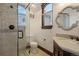 Elegant bathroom featuring a glass shower and mosaic tile at 1043 Meteor Pl, Castle Rock, CO 80108