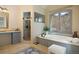 Luxurious bathroom with soaking tub and walk-in shower at 1043 Meteor Pl, Castle Rock, CO 80108