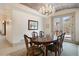 Elegant dining room features a brick barrel ceiling and french doors at 1043 Meteor Pl, Castle Rock, CO 80108