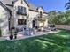 Spacious patio with seating and a grill, perfect for entertaining at 1043 Meteor Pl, Castle Rock, CO 80108