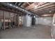 An unfinished basement with exposed beams, framing and insulated walls, showing the potential for customization at 3565 E 141St Dr, Thornton, CO 80602