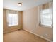 Bright bedroom with carpet and two big windows at 3565 E 141St Dr, Thornton, CO 80602