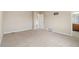 Spacious carpeted bedroom with entry to bathroom at 3565 E 141St Dr, Thornton, CO 80602