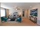 Inviting living room with plush seating, stylish decor, and neutral tones, creating a comfortable atmosphere at 3565 E 141St Dr, Thornton, CO 80602