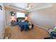 Serene main bedroom featuring a tray ceiling and ample space to relax and recharge at 3565 E 141St Dr, Thornton, CO 80602