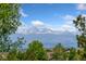Scenic mountain view from property showcasing a clear blue sky with lush green trees at 3565 E 141St Dr, Thornton, CO 80602