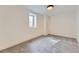 Bedroom with neutral carpet and window offering natural light at 3201 Albion St, Denver, CO 80207