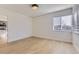 Bright bedroom with warm wood floors and lots of natural light at 3201 Albion St, Denver, CO 80207