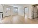 Bright living space with wood flooring and doorway view to another room at 3201 Albion St, Denver, CO 80207