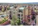 Multi-story condominium building showcasing well-maintained balconies and appealing architectural details at 1044 Rockhurst Dr # 401, Highlands Ranch, CO 80129