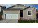 Charming one-story home featuring a two-car garage and inviting curb appeal in a residential neighborhood at 819 Sunflower Dr, Brighton, CO 80601