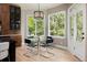 Charming breakfast nook with a glass-top table, modern chairs, and scenic views at 2535 W 115Th Dr, Westminster, CO 80234