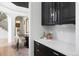 Elegant butler's pantry with quartz countertops, custom cabinetry, and stylish fixtures at 2535 W 115Th Dr, Westminster, CO 80234