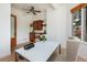 Dining room with stylish built in shelving, hardwood floors, and natural light from a large window at 2535 W 115Th Dr, Westminster, CO 80234