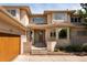 Elegant home featuring a brick facade, well-manicured landscaping, a spacious entryway, and three car garage at 2535 W 115Th Dr, Westminster, CO 80234