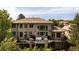 Spacious home with a tile roof, large deck, and a well-manicured yard at 2535 W 115Th Dr, Westminster, CO 80234