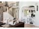 Spacious open-concept living area with modern furnishings, a cozy fireplace, and natural light at 2535 W 115Th Dr, Westminster, CO 80234