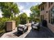 Spacious patio with comfortable seating and a modern fire pit, perfect for outdoor relaxation at 2535 W 115Th Dr, Westminster, CO 80234