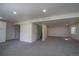 Large basement featuring neutral colored carpet, recessed lighting and multiple access points at 2991 S Zeno Way, Aurora, CO 80013