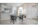 Bright dining room with modern furnishings and an open layout, great for entertaining at 2991 S Zeno Way, Aurora, CO 80013