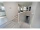 Interior view of the entry staircase and Gathering room beyond at 2991 S Zeno Way, Aurora, CO 80013
