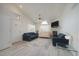 Spacious living room features vaulted ceilings, fireplace, and ample natural light at 2991 S Zeno Way, Aurora, CO 80013