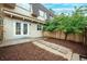 Quaint backyard featuring a stone pathway and a private fenced-in space at 7755 E Quincy Ave # T48, Denver, CO 80209
