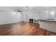 Spacious finished basement area with a fireplace, bar, and ample space for entertainment at 7755 E Quincy Ave # T48, Denver, CO 80209