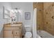 Bathroom featuring classic fixtures, a vanity with ample storage and a tub with a shower at 7755 E Quincy Ave # T48, Denver, CO 80209