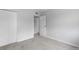 Bedroom featuring a neutral-toned carpet and ample closet space at 7755 E Quincy Ave # T48, Denver, CO 80209