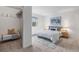 Bedroom with neutral carpet, walk-in closet and natural light at 7755 E Quincy Ave # T48, Denver, CO 80209