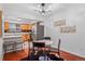 Dining area with modern lighting and access to kitchen at 7755 E Quincy Ave # T48, Denver, CO 80209