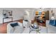 Spacious open concept living room with hardwood floors and natural light at 7755 E Quincy Ave # T48, Denver, CO 80209