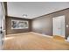 Bright living room with hardwood floors and neutral walls at 749 Poplar St, Denver, CO 80220