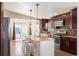Beautiful kitchen featuring stainless steel appliances, granite countertops, and a spacious island at 1522 Willow St, Denver, CO 80220