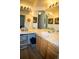Bright bathroom with a large, well-lit vanity and modern fixtures at 9263 E Arbor Cir # B, Englewood, CO 80111