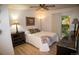 Bright bedroom with sliding glass doors leading to a private balcony at 9263 E Arbor Cir # B, Englewood, CO 80111