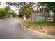 The Enclave community sign surrounded by lush landscaping at 9263 E Arbor Cir # B, Englewood, CO 80111