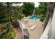 Scenic view of a community pool surrounded by lounge chairs, providing a perfect spot for relaxation and enjoyment at 9263 E Arbor Cir # B, Englewood, CO 80111