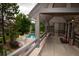 Relaxing pool area featuring a swimming pool, lounge chairs, and lush green landscaping for a tranquil setting at 9263 E Arbor Cir # B, Englewood, CO 80111
