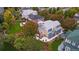 Aerial view of a beautiful home with a backyard patio and lush landscaping at 16456 Wagon Pl, Parker, CO 80134