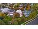 Aerial view of suburban neighborhood with mature trees and well-maintained homes at 16456 Wagon Pl, Parker, CO 80134