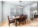 Dining room features hardwood floors, natural light, and is ready for entertaining friends and Gathering at 16456 Wagon Pl, Parker, CO 80134