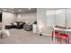 Finished basement living room featuring a seating area and desk space with natural light from a window at 16456 Wagon Pl, Parker, CO 80134