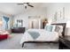 Bright main bedroom with vaulted ceiling, carpet, ensuite bathroom and great natural light at 16456 Wagon Pl, Parker, CO 80134