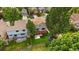 An aerial view of the fenced backyard featuring the lawn, patio, and wooden deck at 3528 Morning Glory Dr, Castle Rock, CO 80109